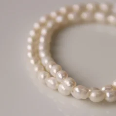 Fresh Water Pearl A Quality Oval, 4-5 mm Natural