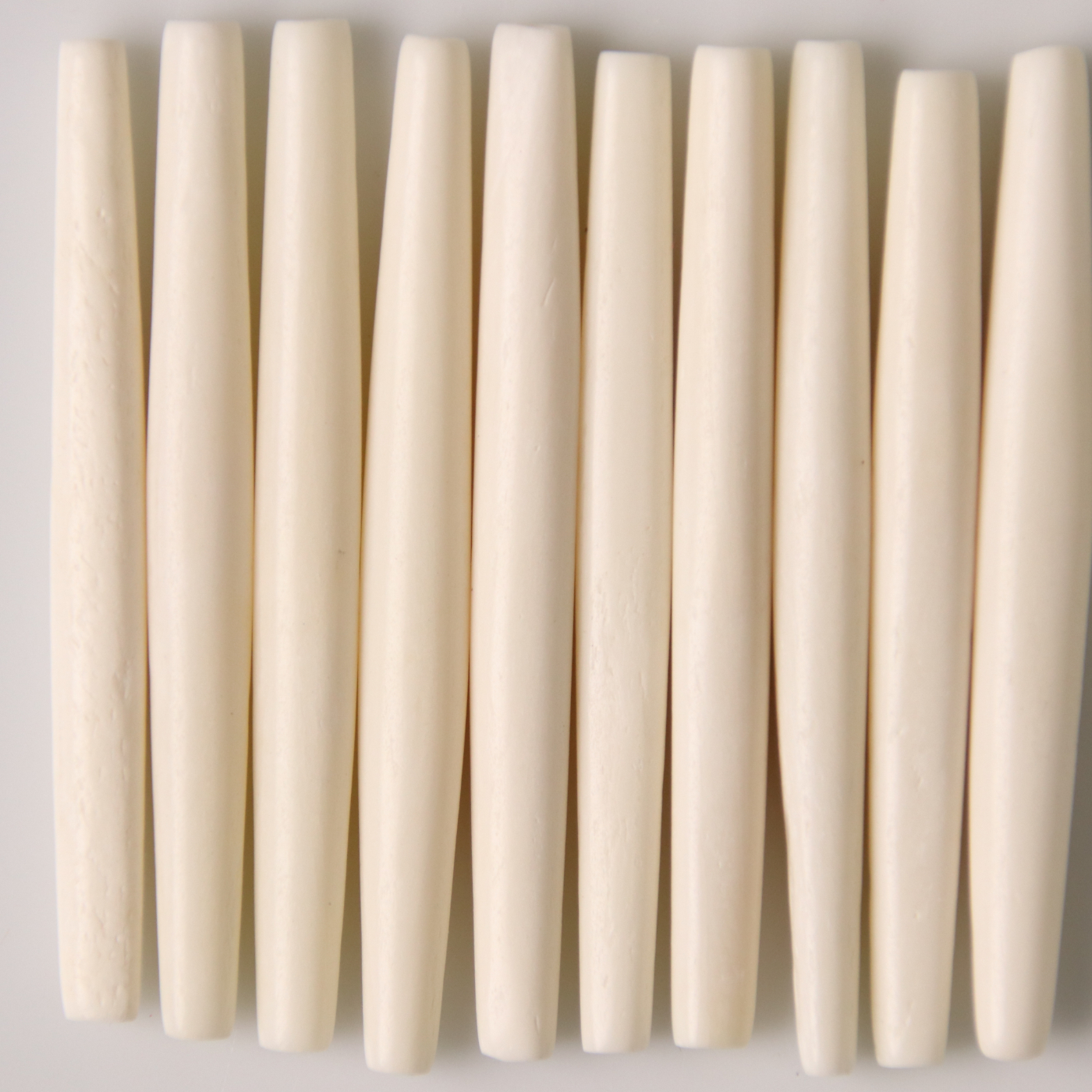 Bead, Bone 2.5 inch Bone Pipe in Dyed White (Hole Size 3mm)