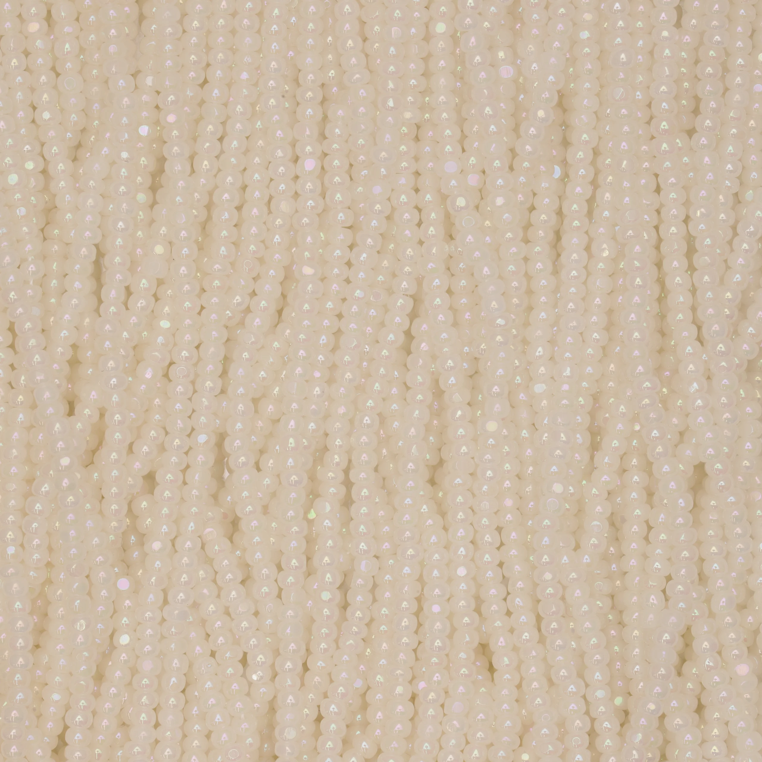Czech Seed Beads, 11/0, Charlotte – Opaque Rainbow White (strung)