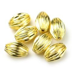 Bead, 9x6mm Corrugated Oval Seamless bead, holesize: 0.75mm - Gold Plated Brass