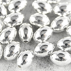 Bead, 7x5mm Oval Metal bead, holesize: 1.2mm - Silver