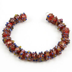 Bead, Venetian 6mm Transparent Ruby Round with Gold Banding and Rose Pattern, holesize: 2mm