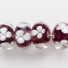 Bead, Lampwork Glass, 12x6mm Rondelle Crystal Glass lined in Amethyst with White Flower (Hole Size 2.3mm)