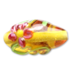 Bead, Lampwork Glass, 16x10mm Oval shape with a raised Flower Design on Amber color bead (Hole Size 2.25mm)