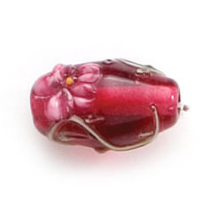 Bead, Lampwork Glass, 16x10mm Oval shape with a raised Flower Design on Rose color bead (Hole Size 2.25mm)