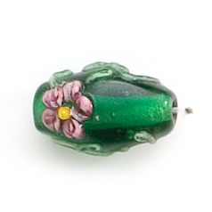 Bead, Lampwork Glass, 16x10mm Oval shape with a raised Flower Design on Emerald color bead (Hole Size 2.25mm)